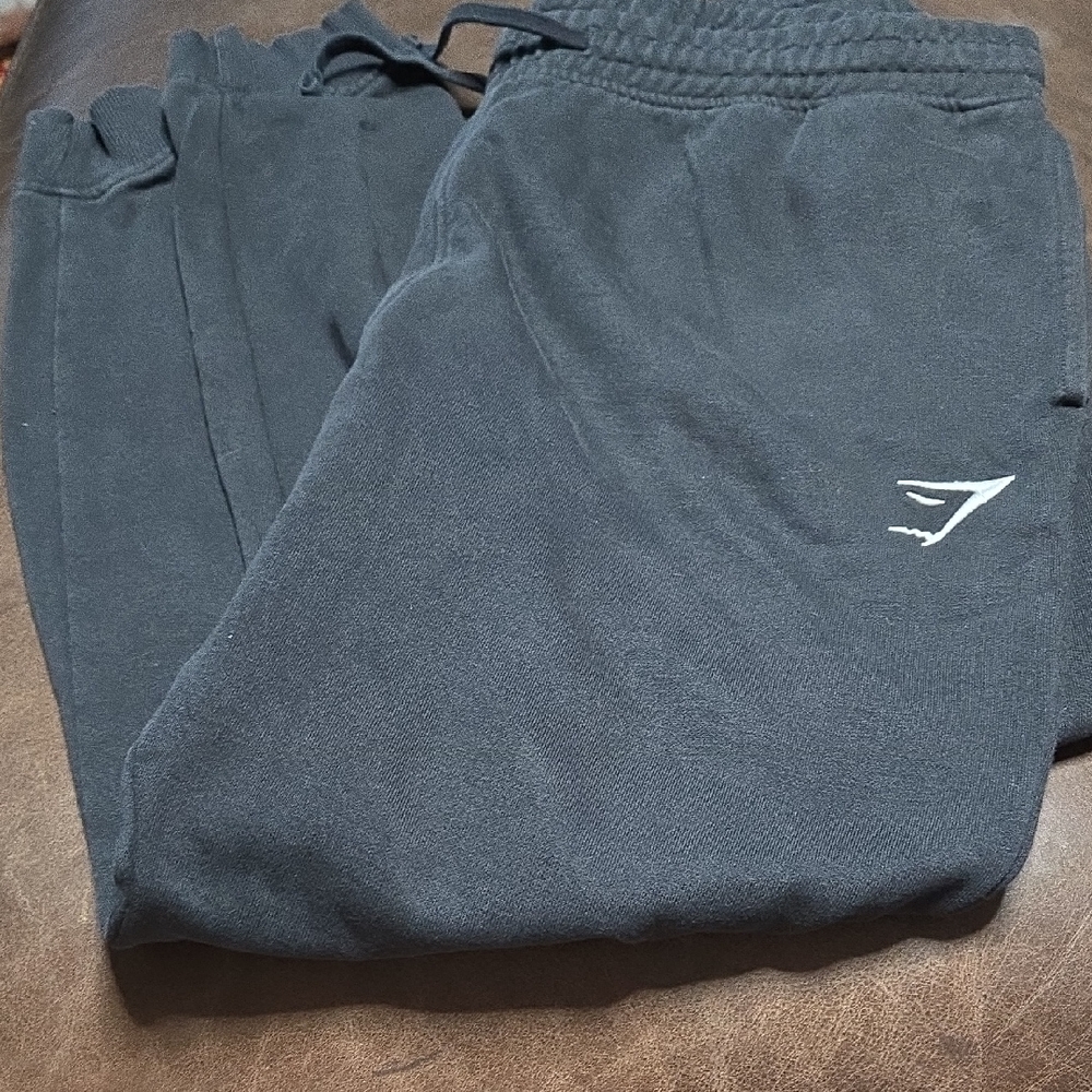 Gymshark Black Joggers with Logo Detail. Slightly Faded,but No Holes Or Snags.
